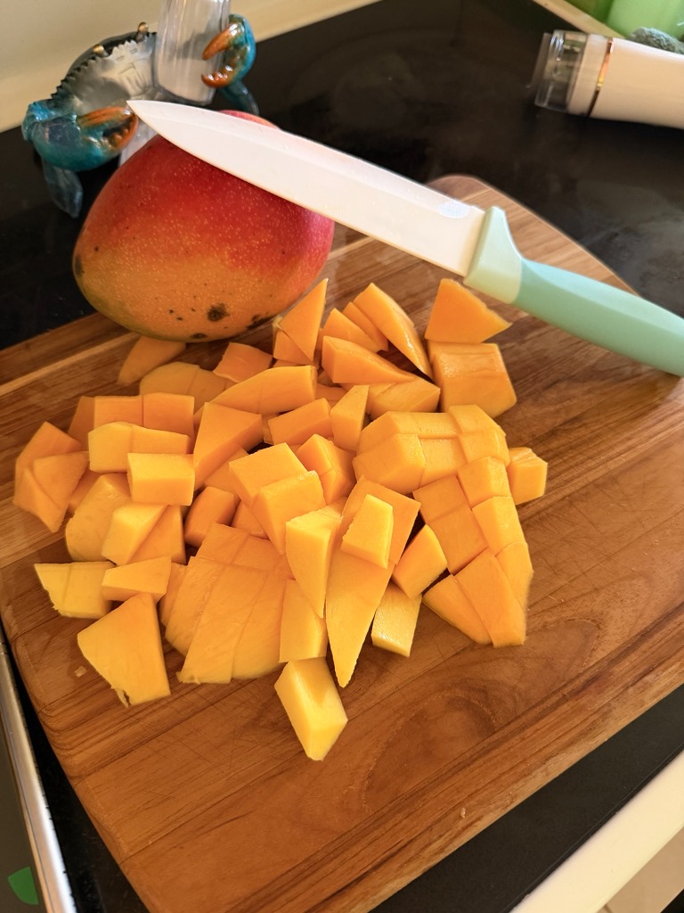 Fresh Diced Mango on Cutting Board